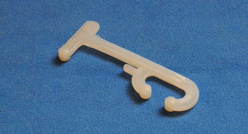 Зажим (прищепка) для білизни, запобігає ковзанню.